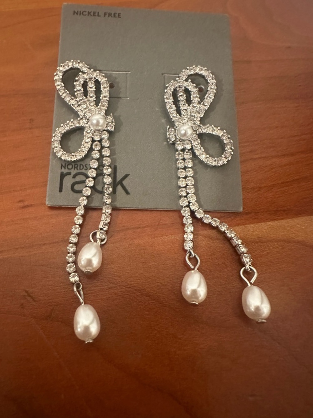 Sparkling Silver Bow Drop Earrings with Pearl Drops -Formal occasions